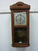 Early 20th century oak cased chiming wall clock H79cm