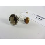 Silver ring set with smoky quartz London 1978 and a tiger's eye ring