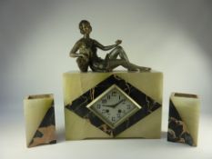 1930s French Art Deco period three piece marble and onyx clock garniture,