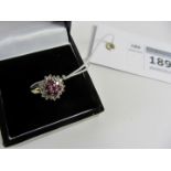 Ruby and diamond cluster ring hallmarked 9ct