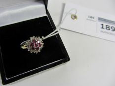 Ruby and diamond cluster ring hallmarked 9ct