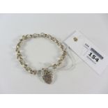 Curb chain link bracelet with heart shaped lock stamped 925