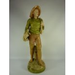 Early 20th century Royal Dux figure of a boy, pink pad mark and  impressed numbers to base 1571 H53.