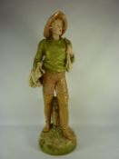 Early 20th century Royal Dux figure of a boy, pink pad mark and  impressed numbers to base 1571 H53.