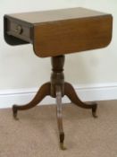 Regency mahogany drop leaf table on tripod pedestal base fitted with two drawers,