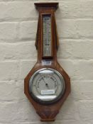 Art Deco period crossbanded walnut aneroid barometer with thermometer H51cm