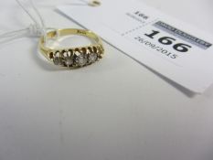 Five stone diamond ring stamped 18 (one stone missing)