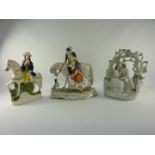 Staffordshire figure group of lovers under an arbour H22cm,