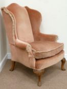 Early 19th century wing back upholstered armchair