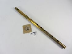 Military brass tin whistle trade mark stamped J. W. S. L.