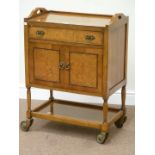 20th century walnut tea trolley fitted with drawer, cupboard and undertier,