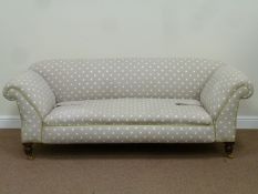 Victorian walnut framed double drop arm sofa upholstered in grey and white poker dot fabric,