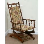Early 20th century American rocking armchair with upholstered seat and back