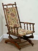 Early 20th century American rocking armchair with upholstered seat and back