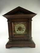 Edwardian mantel clock in architectural carved oak case H39.