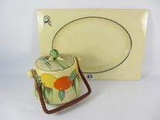 Clarice Cliff 'Delicia Citrus' pattern biscuit barrel and cover H24cm overall and a Biarritz