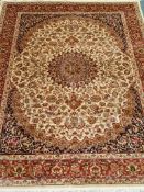 Persian Keshan design beige ground rug,