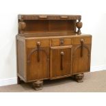 Early 20th century Art Deco style oak sideboard fitted with three drawers and three cupboards,