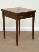 Edwardian mahogany envelope top card table revealing sunken counter wells, single frieze drawer,