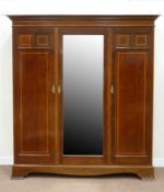 Edwardian inlaid mahogany triple wardrobe enclosed by two panelled and one centre mirror glazed