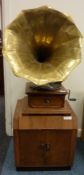 Brass horn wind up gramophone with Art Deco period record cabinet and records Condition Report