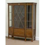 Edwardian inlaid mahogany serpentine breakfront display cabinet enclosed by single glazed door,