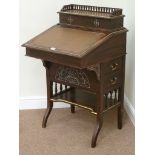 Edwardian mahogany davenport, sloped top enclosing fitted interior, two drawers to the side,