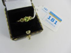 Three stone peridot gold ring hallmarked 9ct