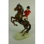 Beswick huntsman on rearing bay horse,