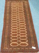 Persian Bokhara fine hand knotted brown ground runner rug,