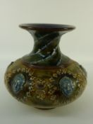 Royal Doulton stoneware vase decorated with masks, foliage etc,