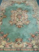 Chinese washed woollen jade ground rug,