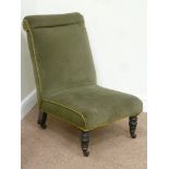 Early Victorian nursing chair upholstered in green fabric,