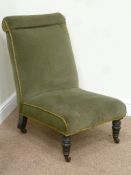 Early Victorian nursing chair upholstered in green fabric,