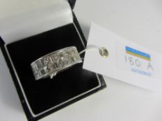 White gold ring set with rows of baguette diamond and diamonds hallmarked 14ct