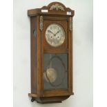 Early 20th century oak cased wall hanging clock, H77cm,