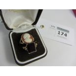 Early 20th century garnet ring hallmarked 9ct and a cameo ring stamped 9ct