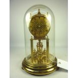 Kundo clock in glass dome,