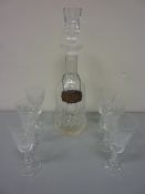 Waterford cut crystal sherry decanter together with a hallmarked silver decanter label H34cm and