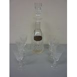 Waterford cut crystal sherry decanter together with a hallmarked silver decanter label H34cm and