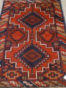 Persian Balochi red and blue ground rug,