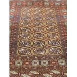 Persian Bokhara karki and red ground rug,