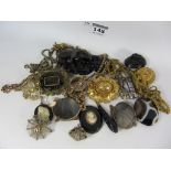 Victorian jet and other brooches, mourning jewellery, Georgian buckle,