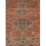 Persian Shiraz red ground rug,