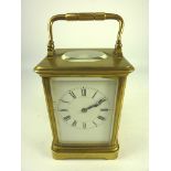 19th/20th century brass carriage clock (H15cm) and one other clock with quartz movement (H14cm)
