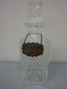 Waterford cut crystal whisky decanter together with a hallmarked silver decanter label H25.