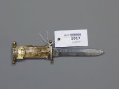 Indian folding dagger, 11cm single edge blade, brass grip stamped 'MMOHD DIN & BROS 6 W.Z.