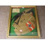 Hitler Youth shirt and other related ephemera mounted in display case 67cm x 57cm overall