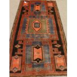 Persian Hamadan red and blue ground rug,