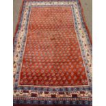 Persian Hamadan red ground rug,